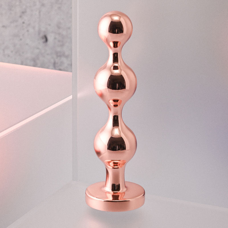 Gender X GOLD DIGGER SMALL - Small Butt Plug with Black Gem Base