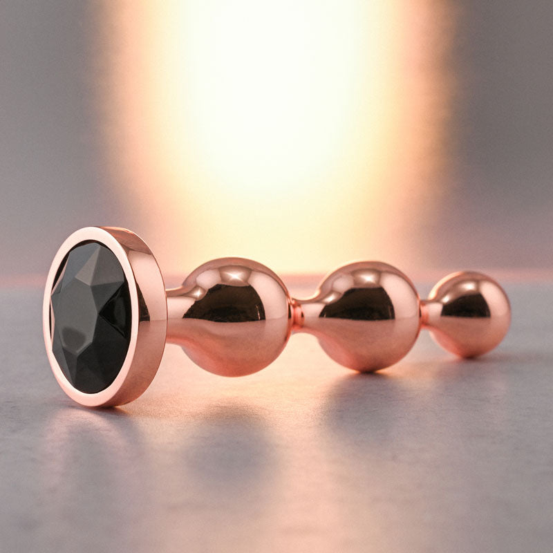 Gender X GOLD DIGGER SMALL - Small Butt Plug with Black Gem Base