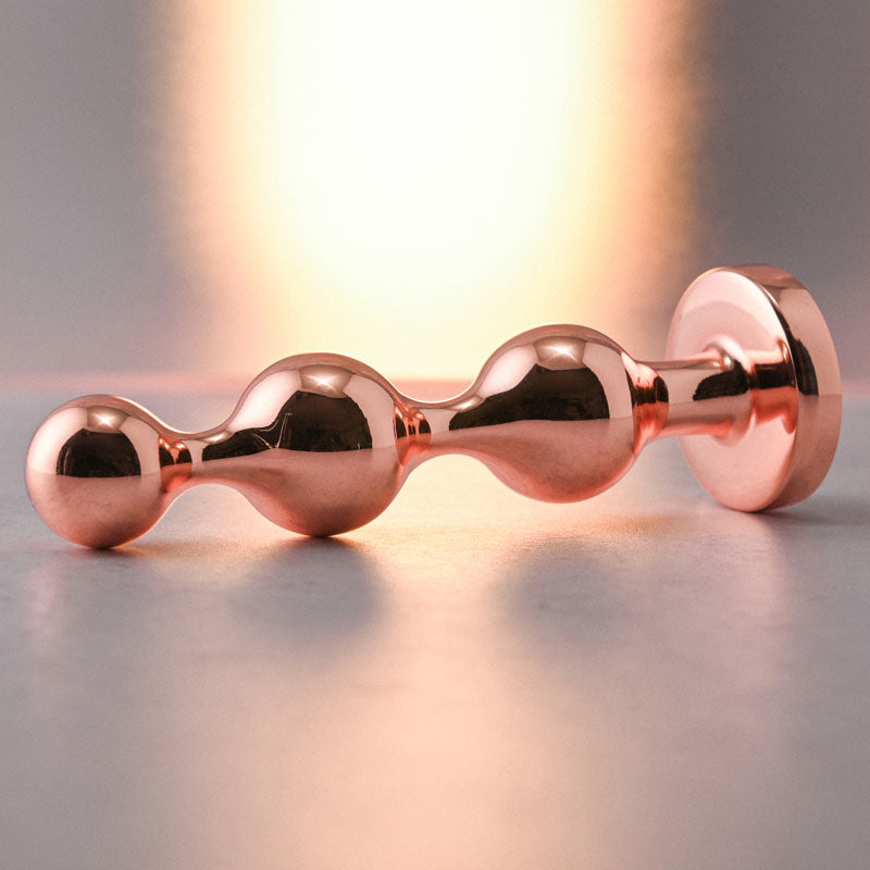 Gender X GOLD DIGGER SMALL - Small Butt Plug with Black Gem Base