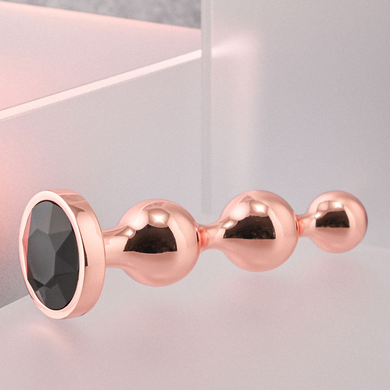 Gender X GOLD DIGGER SMALL - Small Butt Plug with Black Gem Base